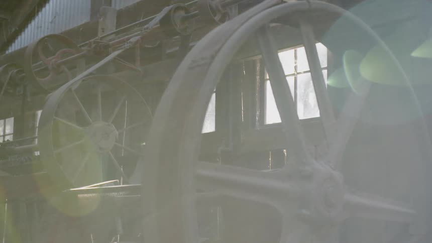 The engine room has large wheels with belts
