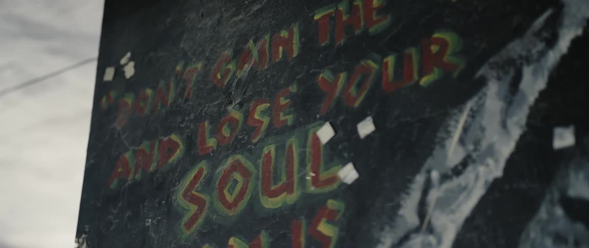 The sign is covered with red letters