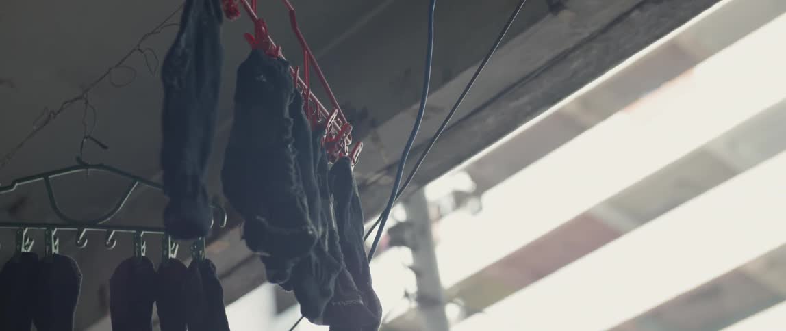 The clothes are hanging on the line