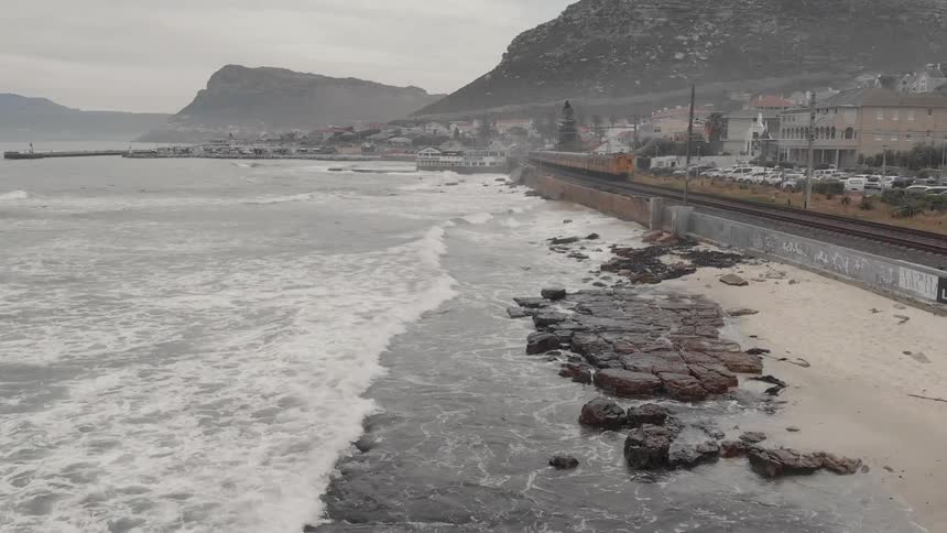 The roush waves crash against the shore