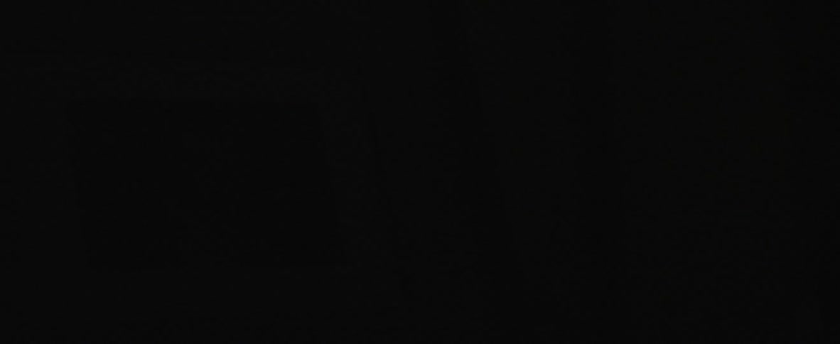 Lights briefly illuminate a photo