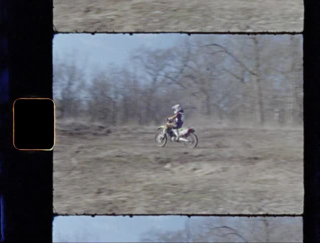 Person is doing a jump over a hill on motorcycle