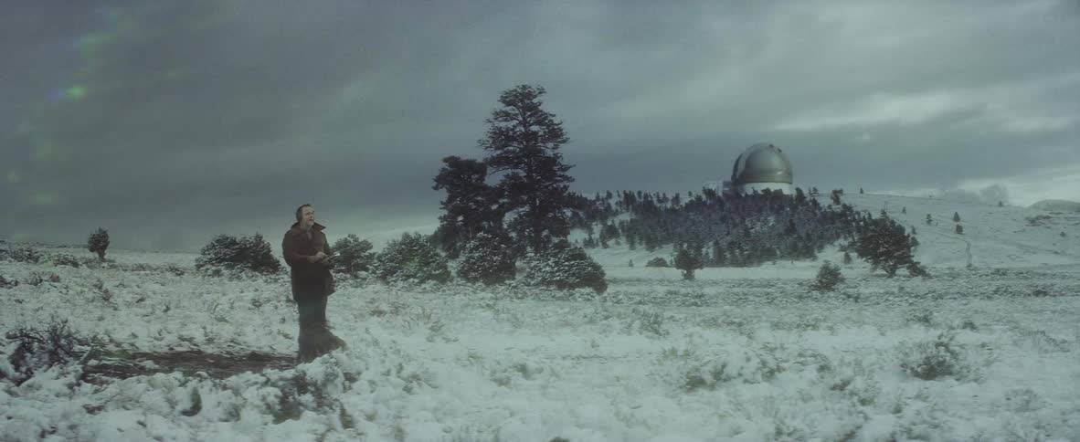 A person standing out in the snow