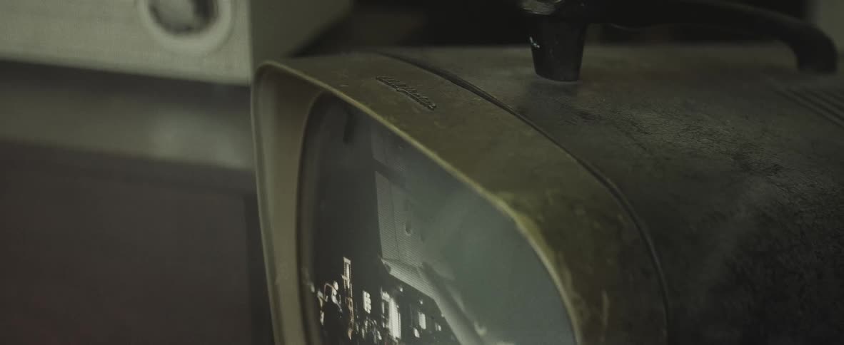 Close up of a monitor with a show running on it