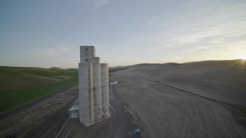 Flying next to a rural farmland grain silo