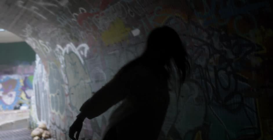 Woman dancing underground in the afternoon