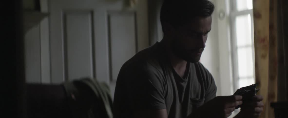 A person in a grey shirt