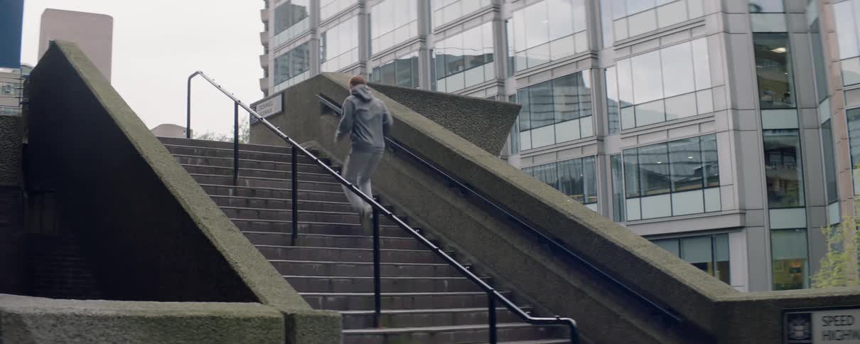 Man races up steps while exercising