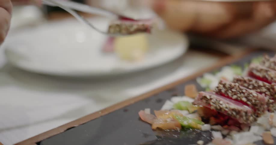 Food is scooped onto a plate