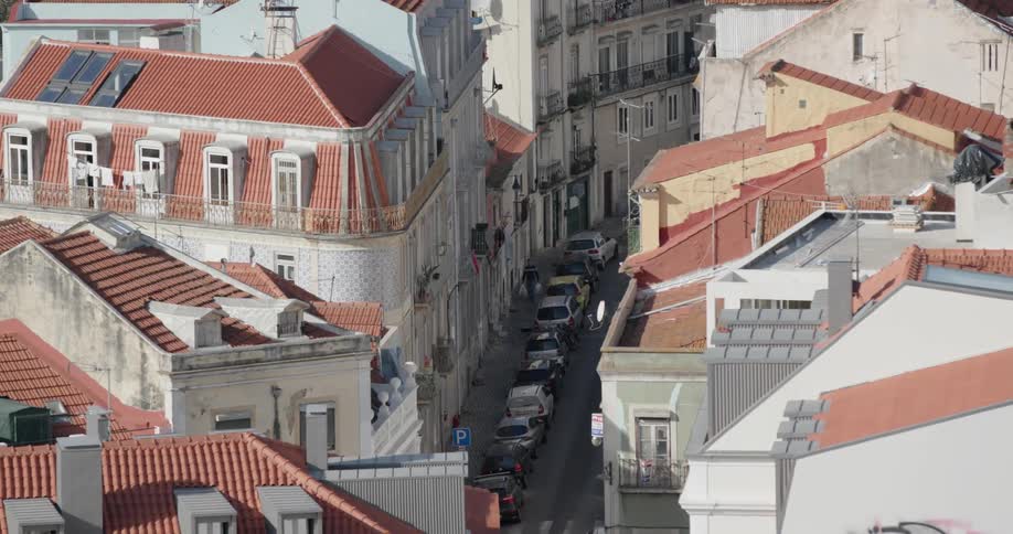 Cars are parked on a city street
