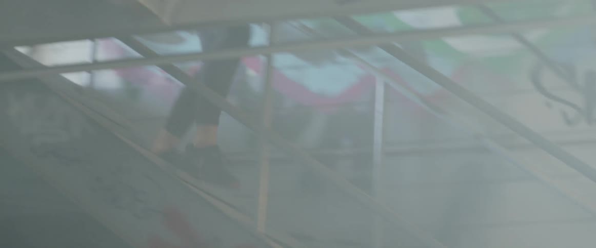 A woman races up and down the stairs