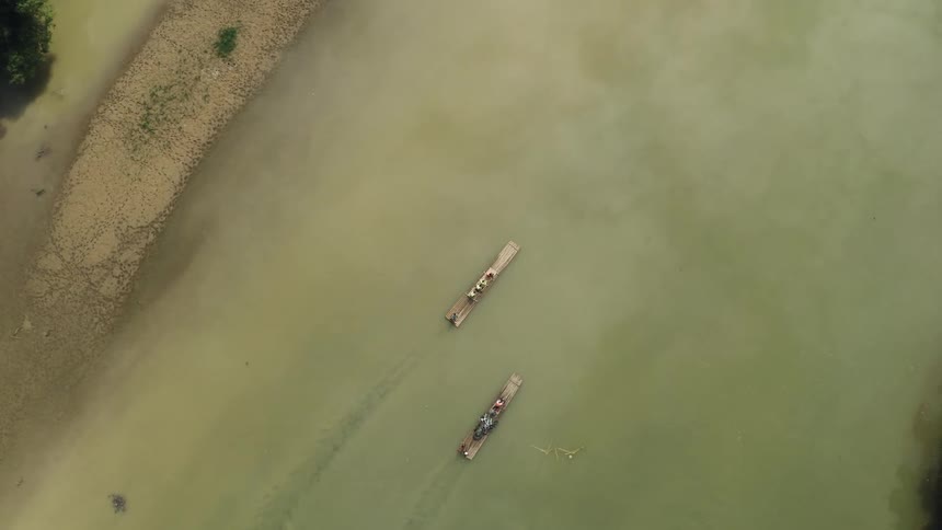 Boats float on a river