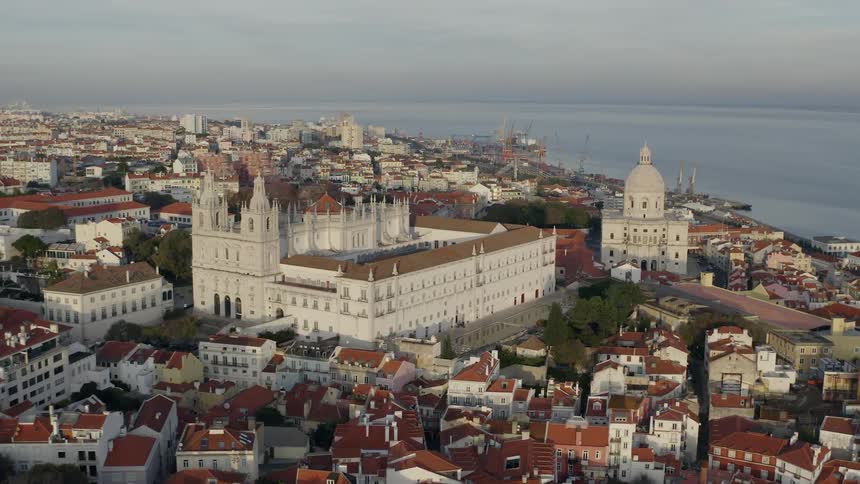 Buildings sit on a coastline