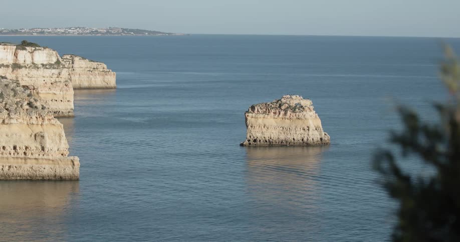 The large rocks are pointing out of the lake