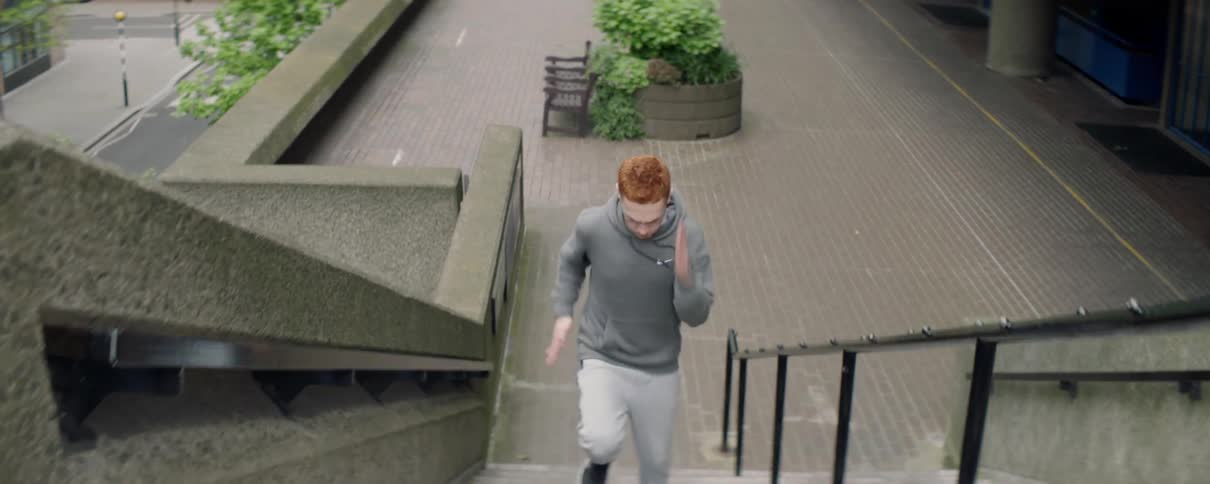 Man sprints up steps while exercising