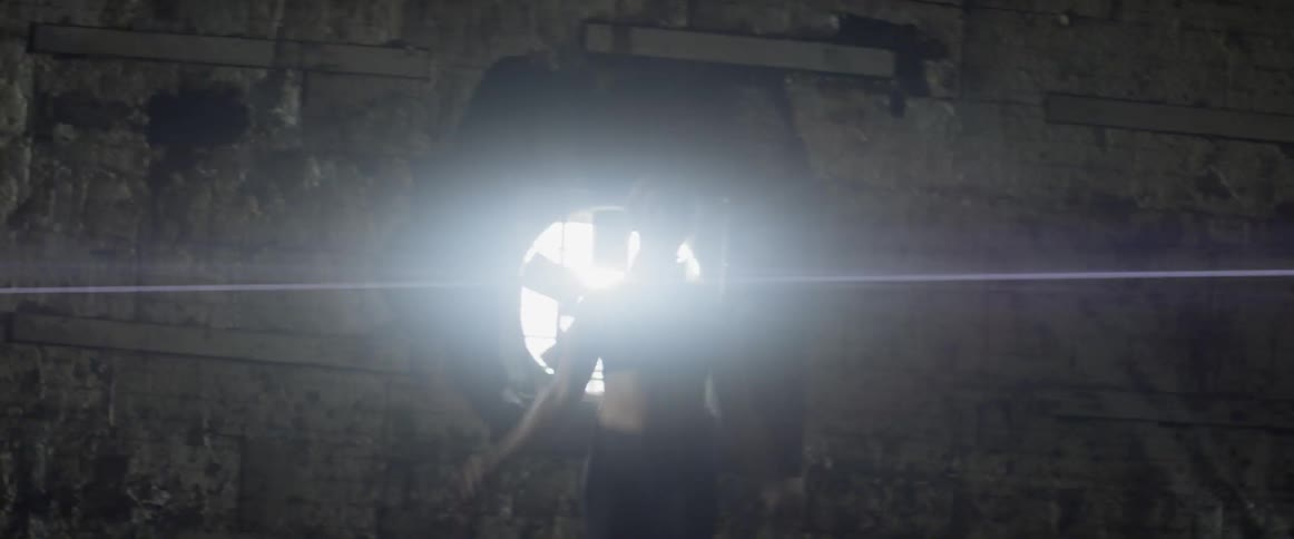 Woman jumps rope in a warehouse