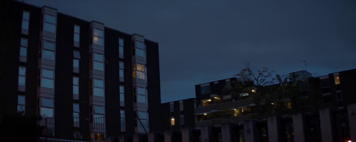 View of apartments at night