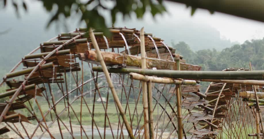 Rustic watermills turning