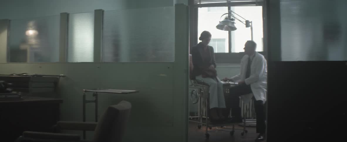 A person talking to a doctor