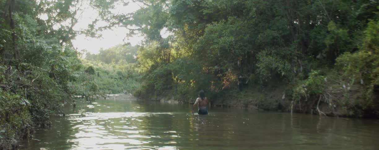 Man walks in a lake