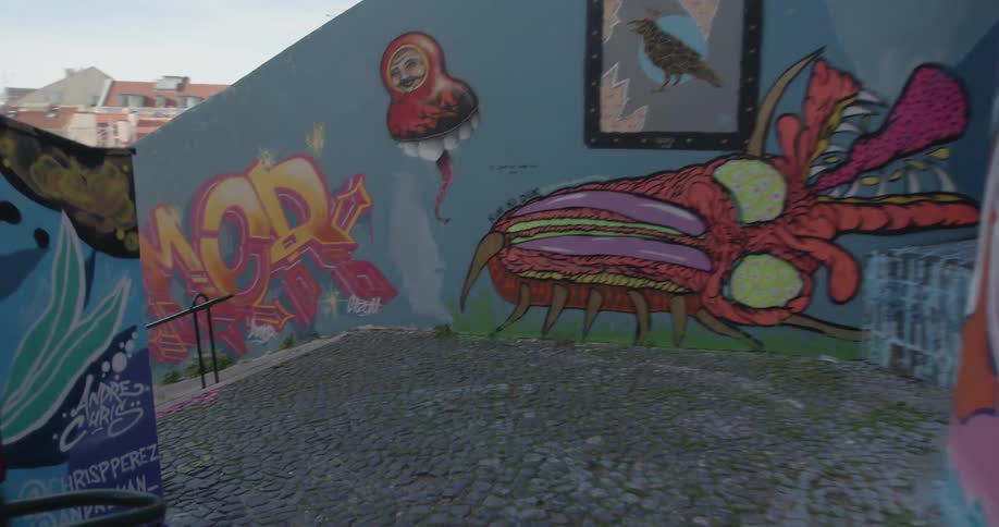 Graffiti covers the walls by the stairs