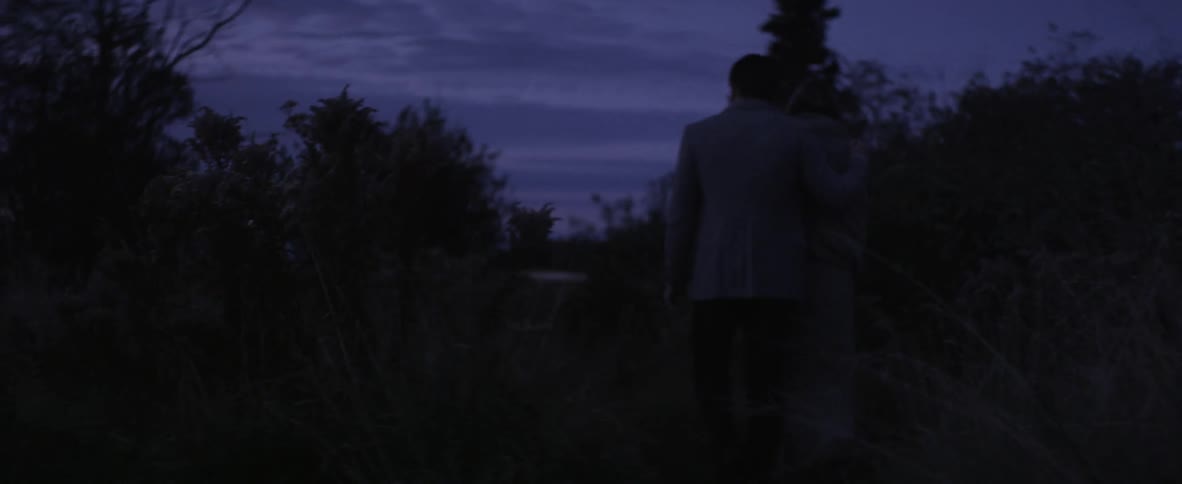 People walking in the dark