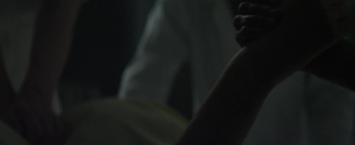 A woman is receiving medial attention for an emergency