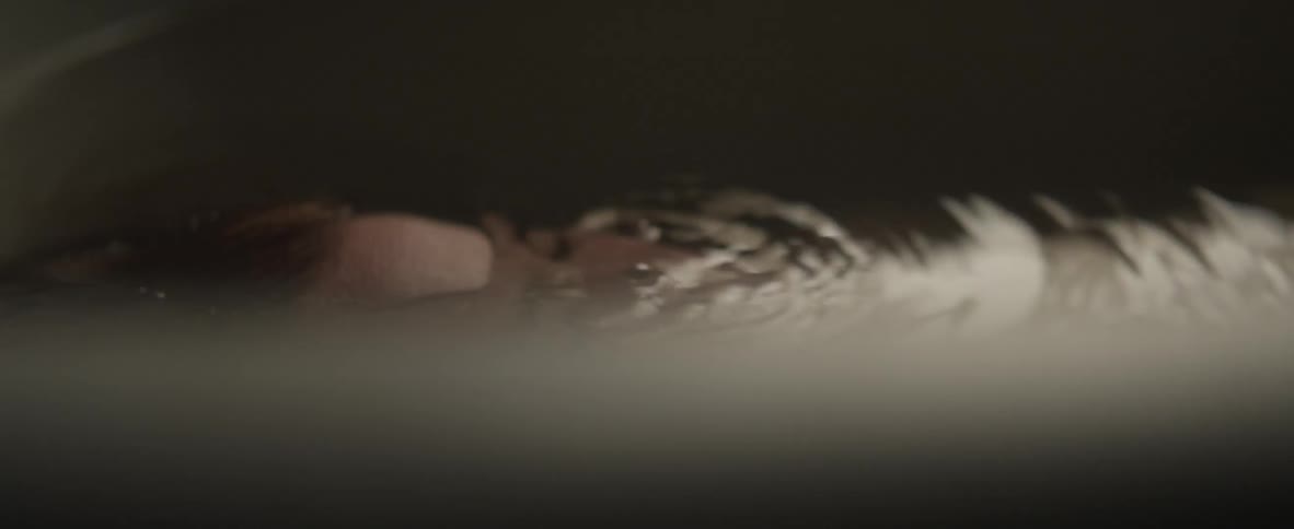 Person slowly goes underwater