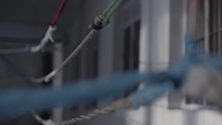 Light shining on ropes of boxing ring