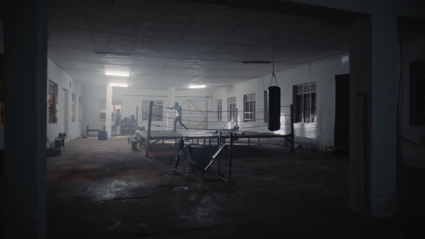 A man trains in a boxing ring