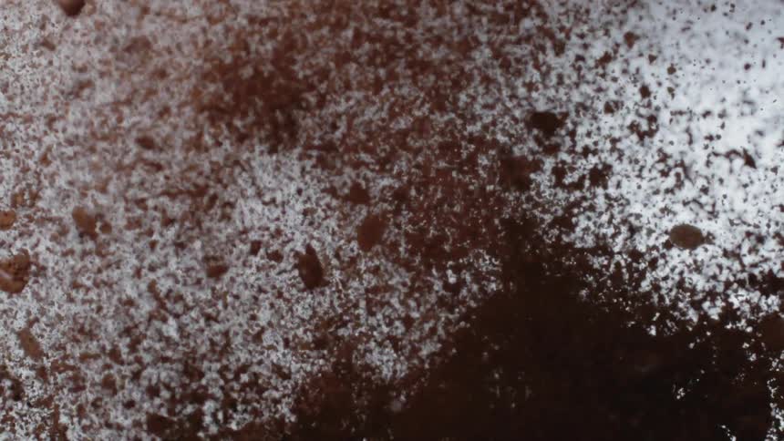 The coffee grounds explode all over the room