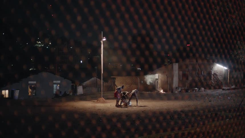Gand of boys beat another boy at night