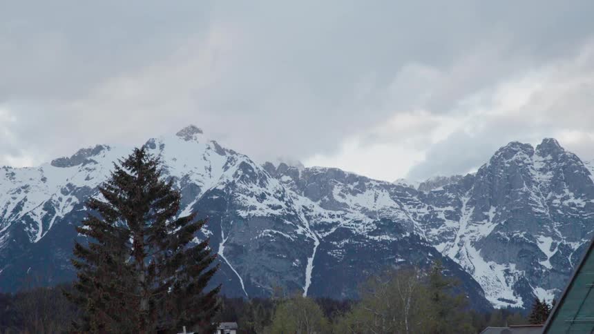 The mountain is covered with snow ahead