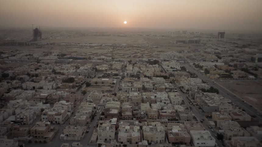 The sun sets over the horizon