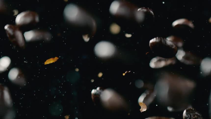 Coffee beans fly through the air