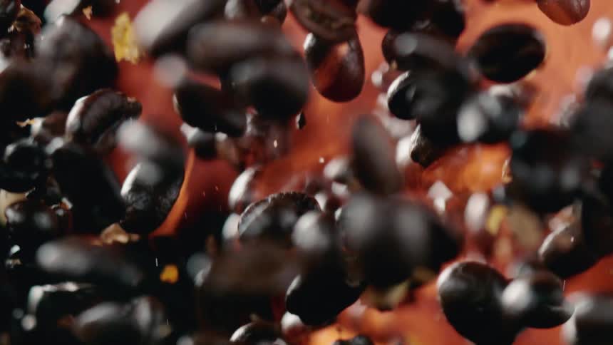 Coffee beans flying through the air