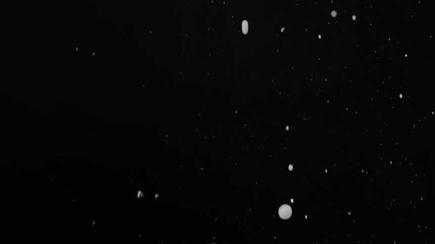 Liquid explodes in the air