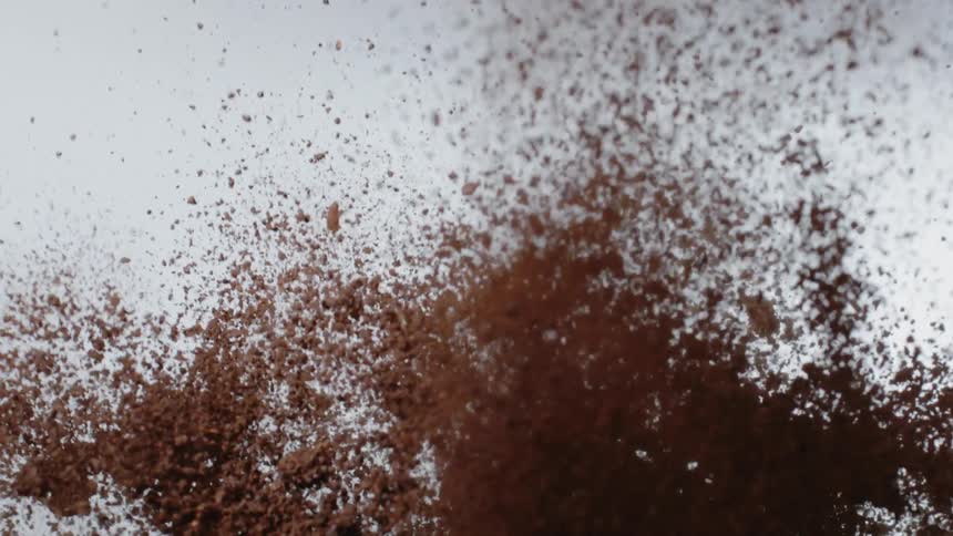 The coffee explodes in the bright room