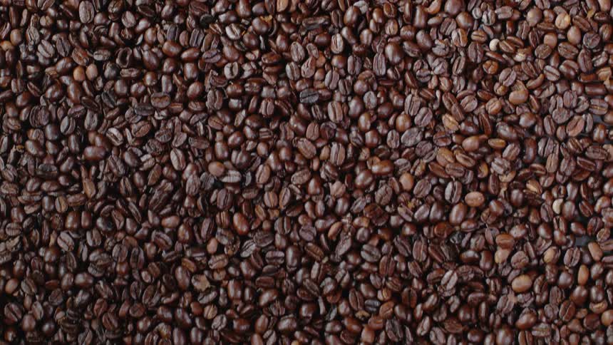 Coffee grounds are pushed together