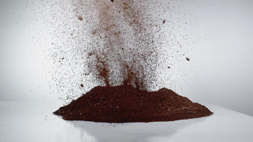 A pile of coffee explodes in the air