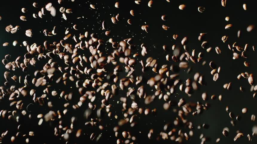 Coffee beans fly through the air