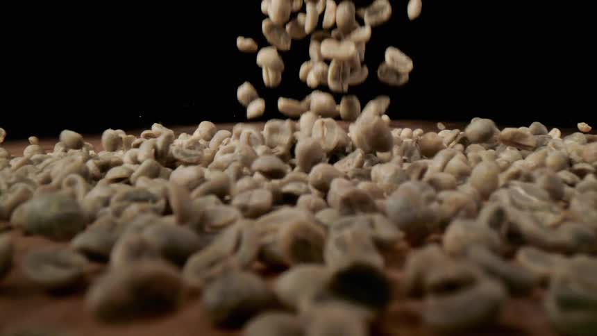 Peanuts falling down on a table