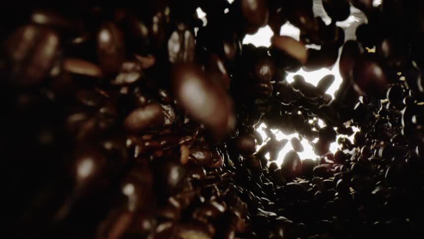 The coffee grounds spin in a circle going up