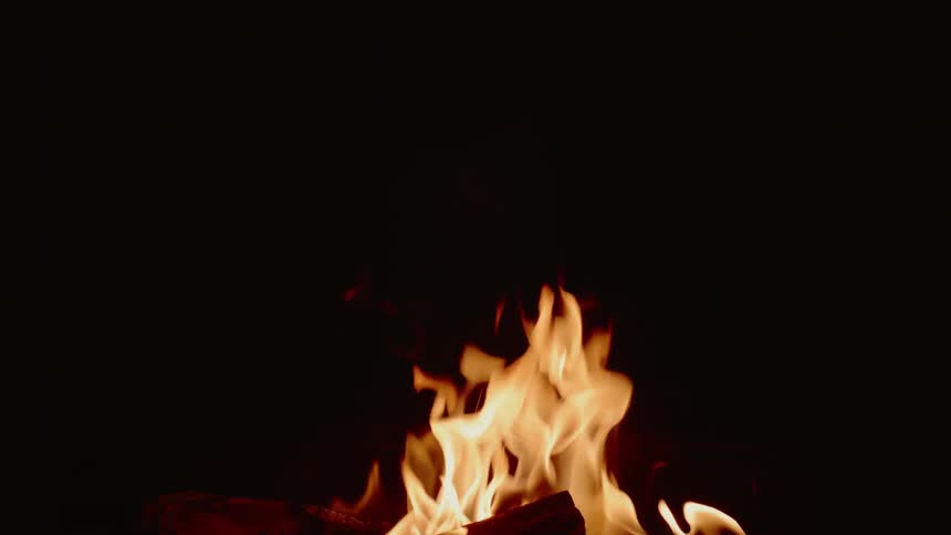 The fire burns at night