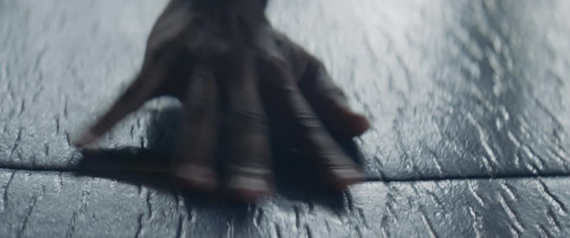 A person gets up from the ground in the gym