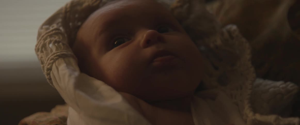 Close up of a baby looking around