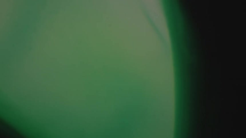 Green light thru a lens