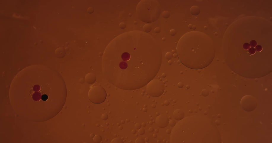 Small bubbles with dots forming and spreading