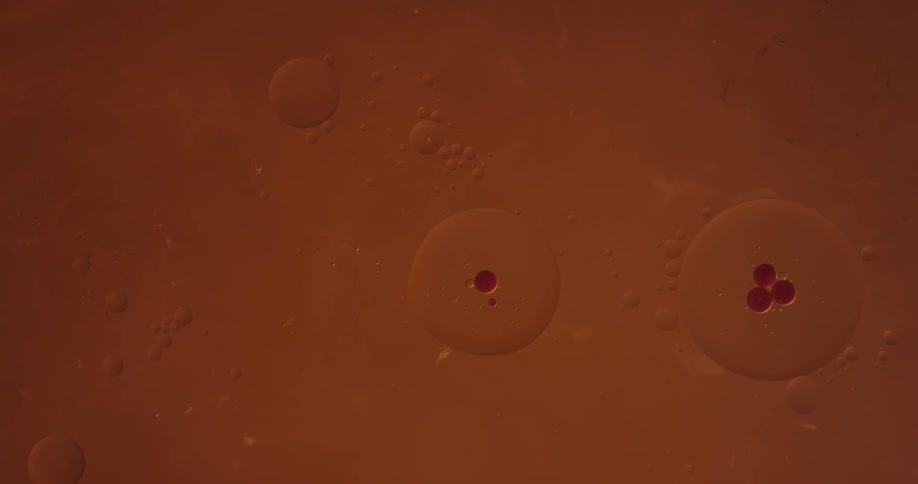 Orange liquid flowing slowly