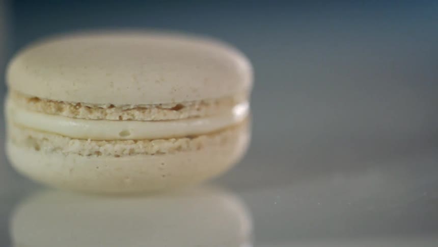 A round cookie spins on the surface